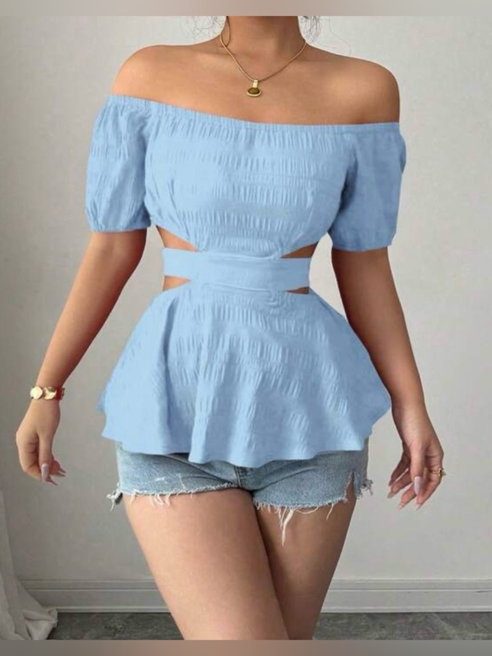 Women’s Blue Cutout Peplum Top
